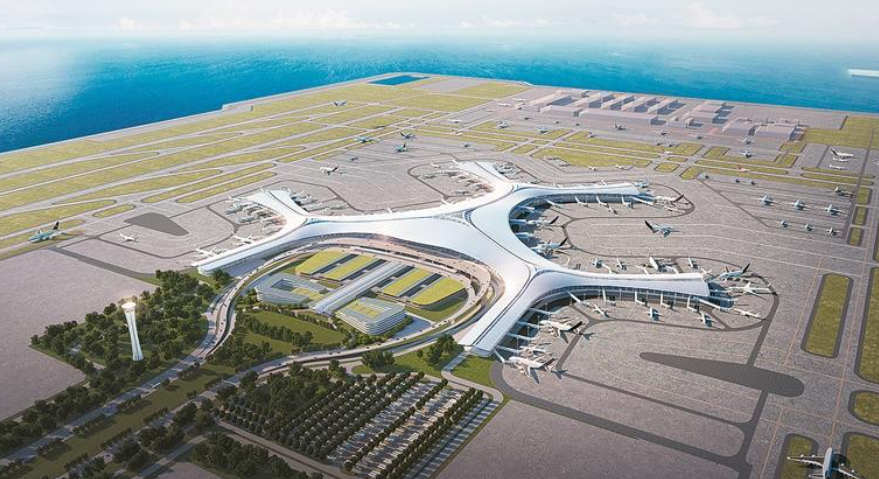大连金州湾国际机场效果图。航站楼设计采用创新的两级放射构型,中央主楼连通6条候机指廊,布局规划77个近机位,可实现飞机双向进出,运行高效。(图片来源:受访单位提供)